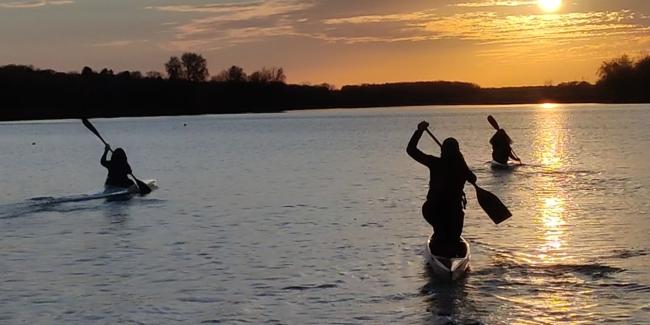 Girls Paddling in Fall